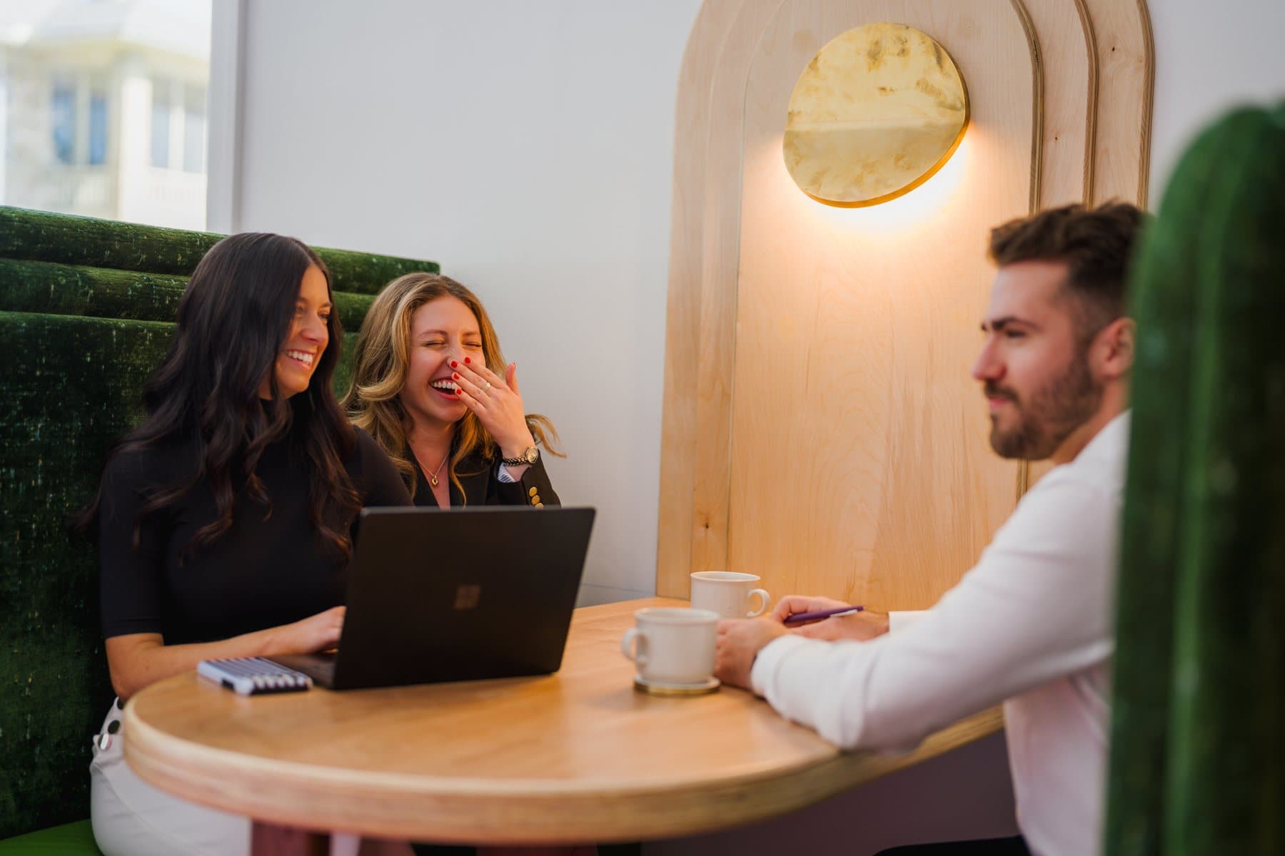 A Greenville real estate consultation at a table